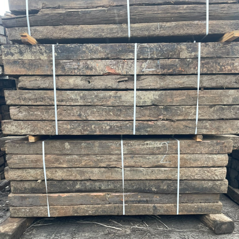 Strapped bundles of purified reclaimed European softwood railway sleepers