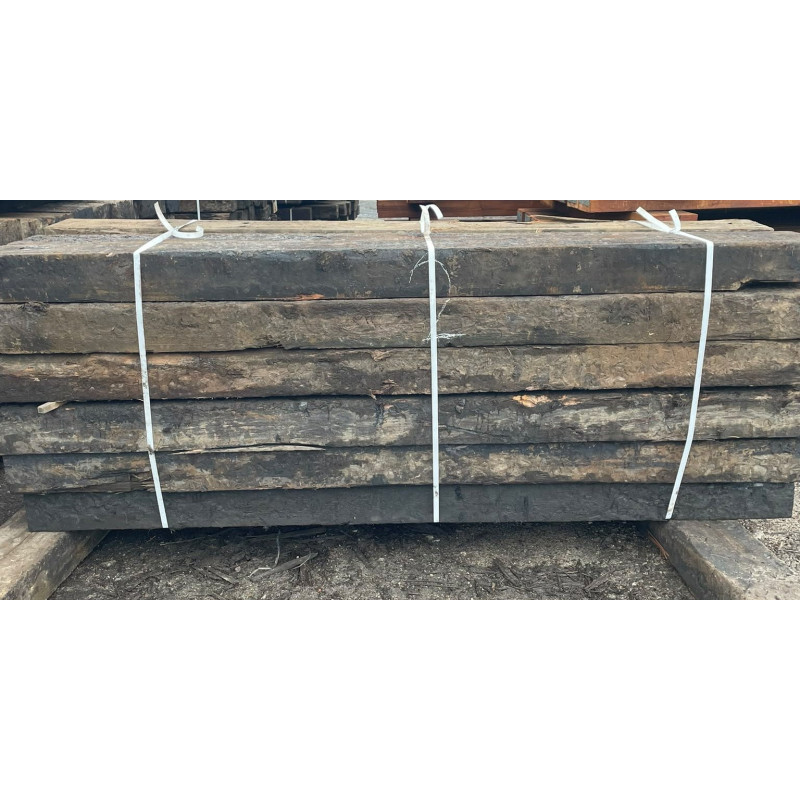 Single strapped bundle of purified reclaimed railway sleepers