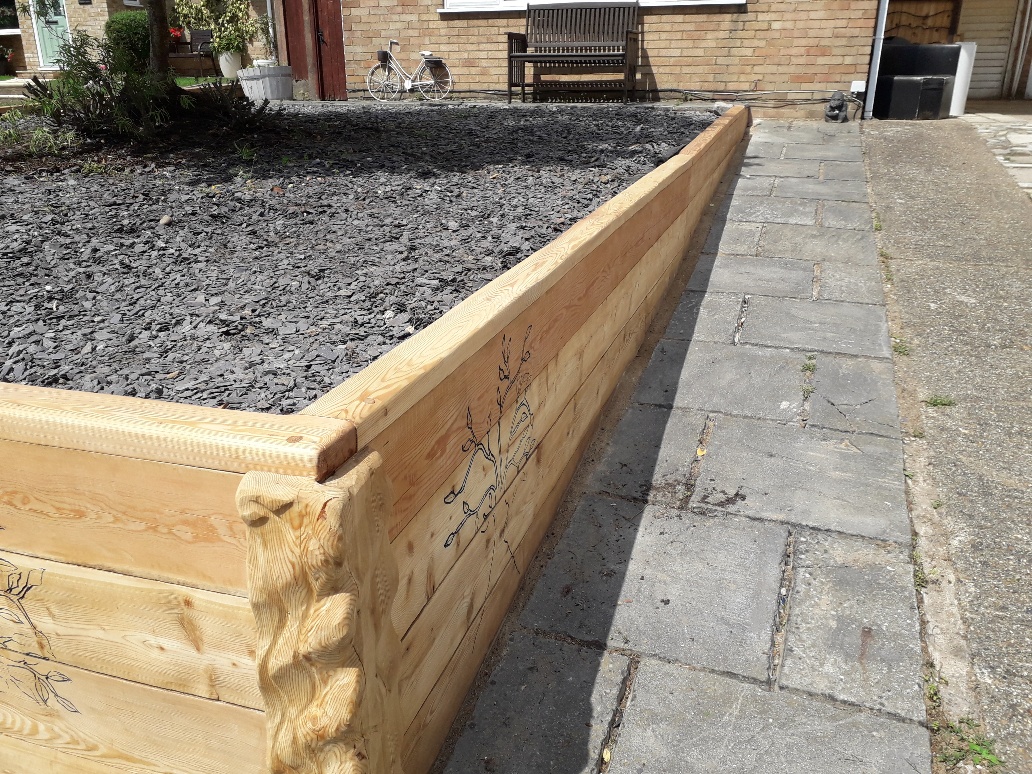 Siberian Larch Railway Sleepers used for a garden Retaining Wall