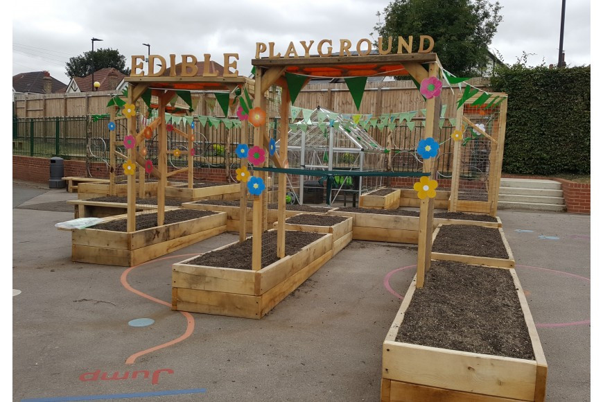 A PLAYGROUND LANDSCAPING PROJECT WITH OAK RAILWAY SLEEPERS
